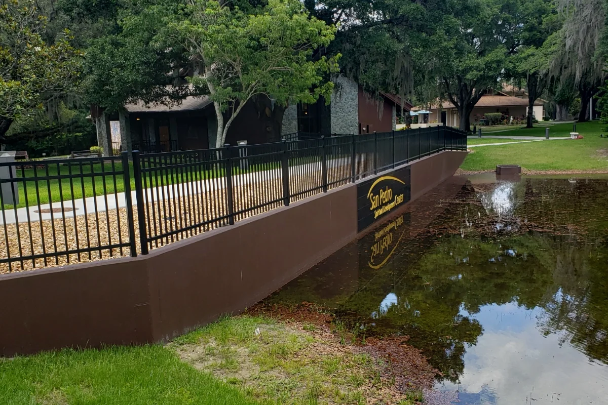 sidewalk and railing over water
