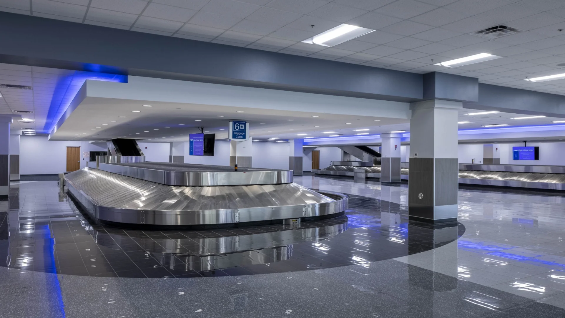 baggage claim area with blue lights