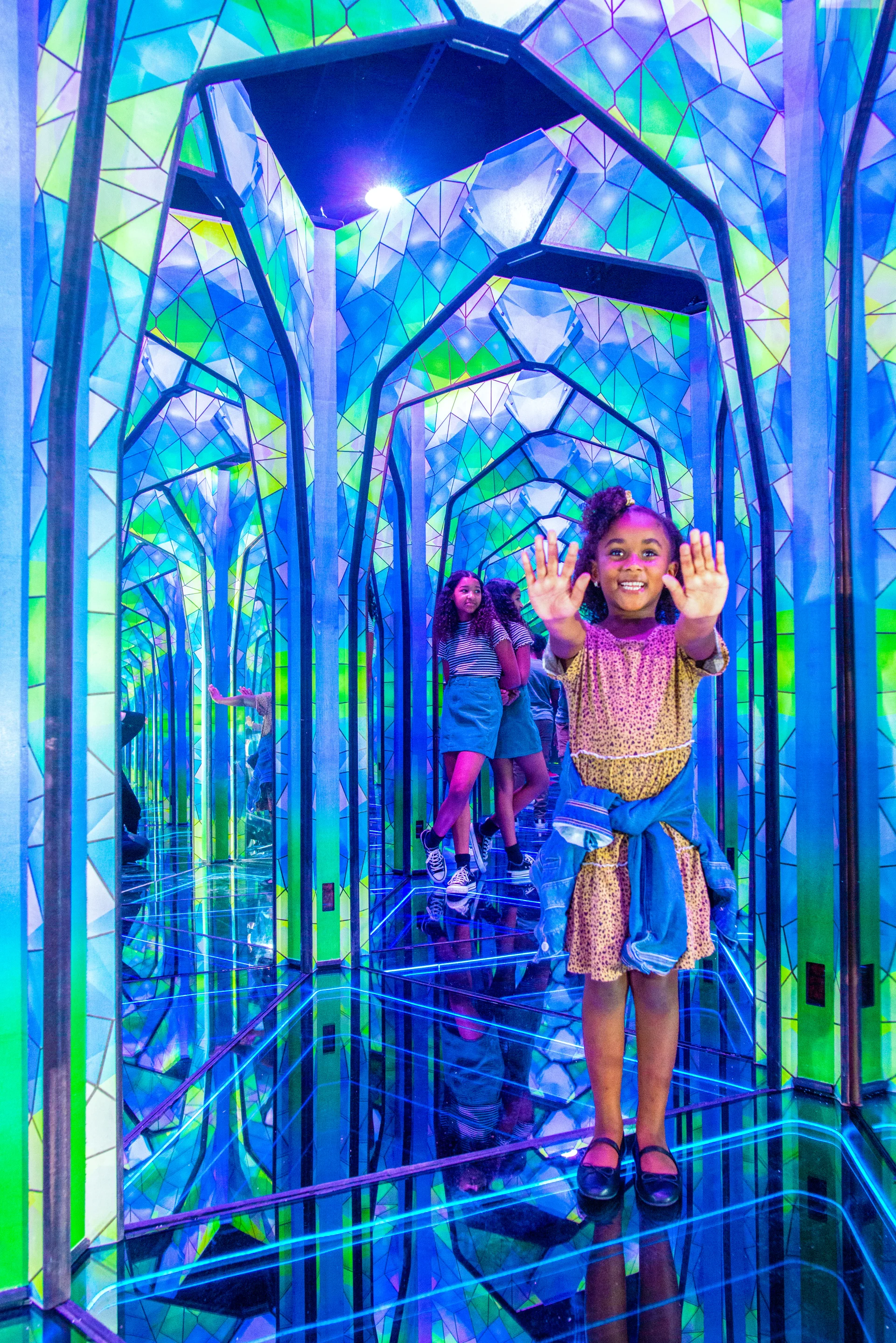 little girl in mirror maze