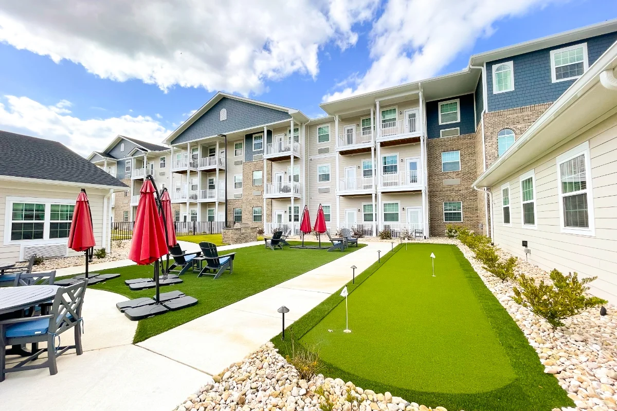 bui;ding exterior balconies, courtyard, and outdoor seating