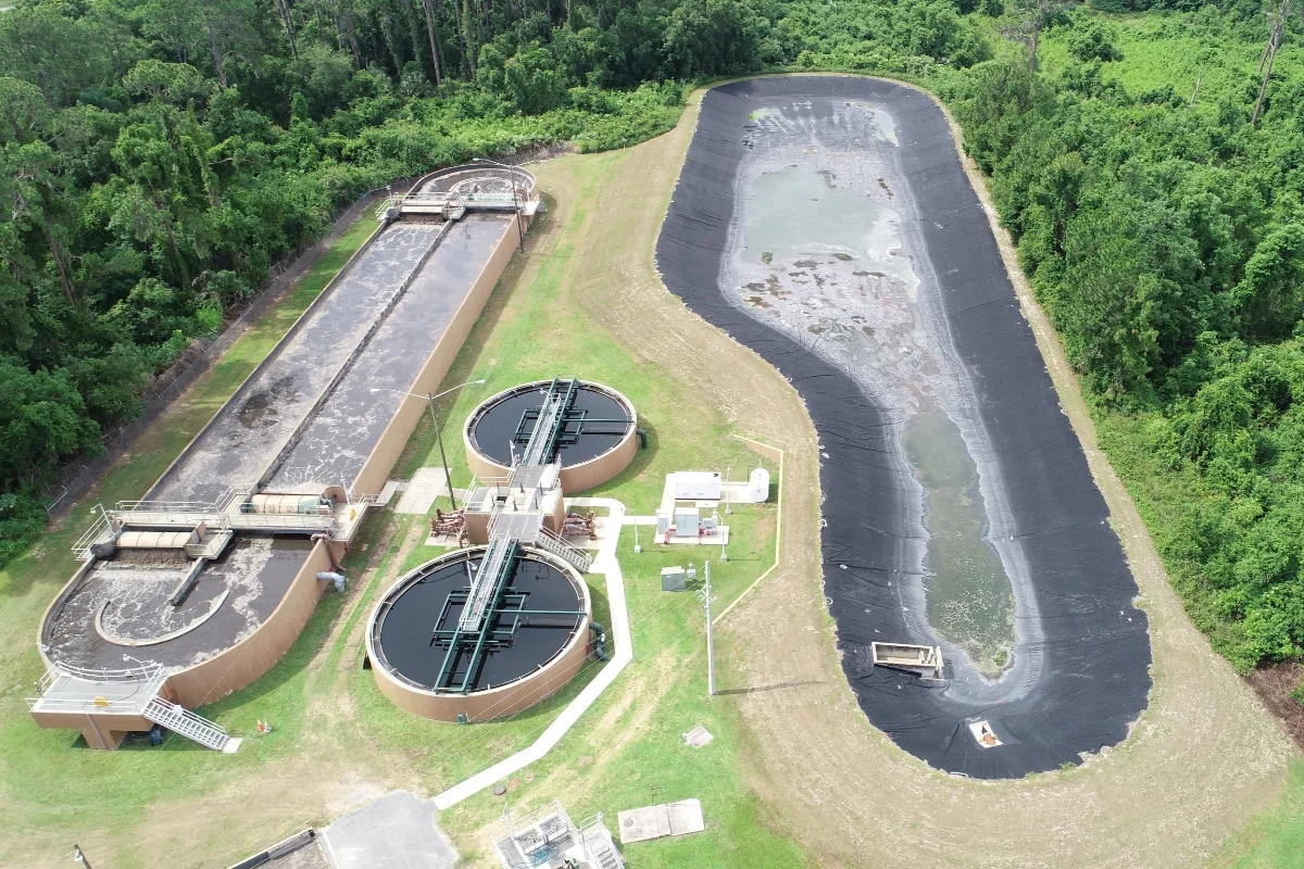large oblong water pool and smaller treatment pools