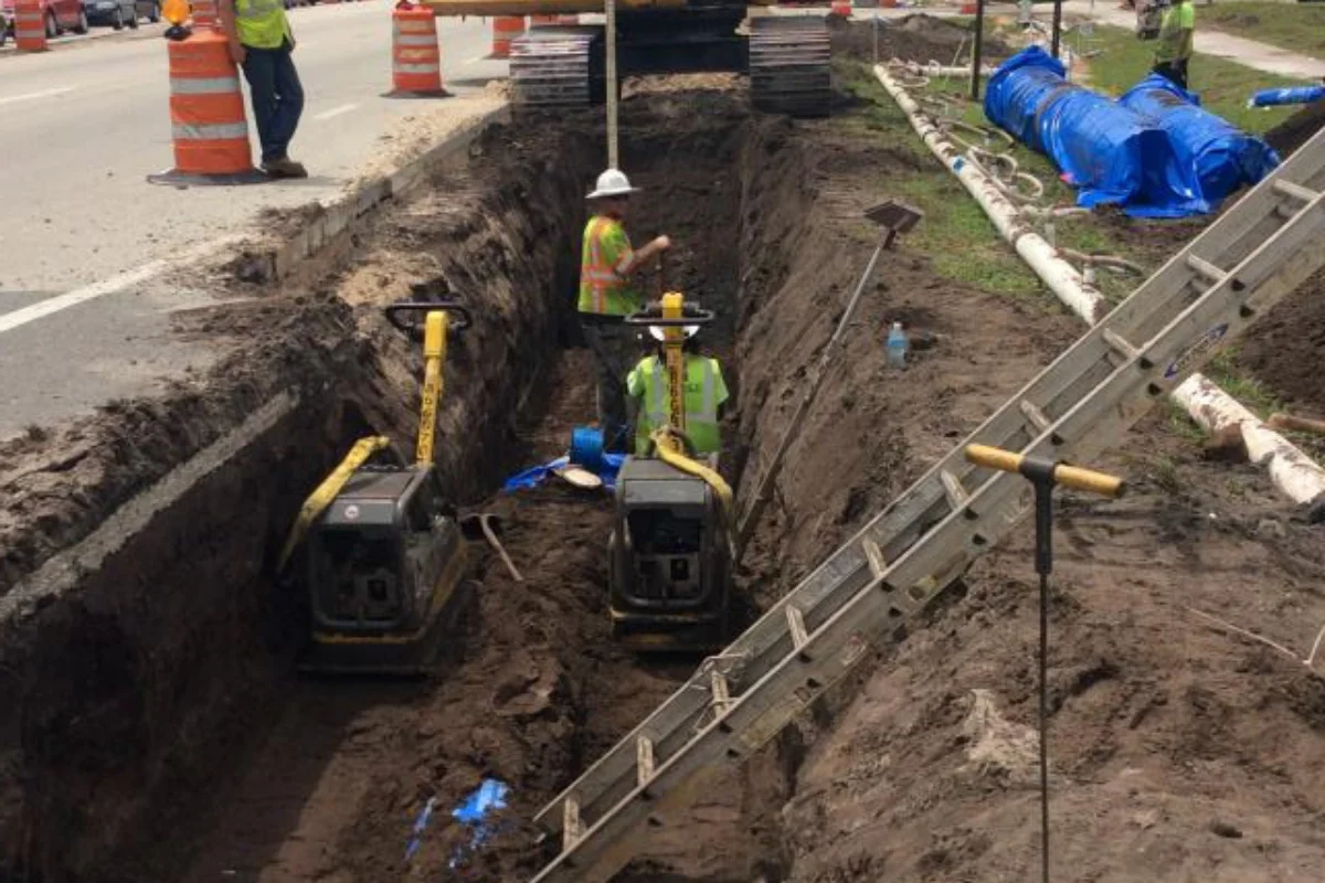 workers excavating land