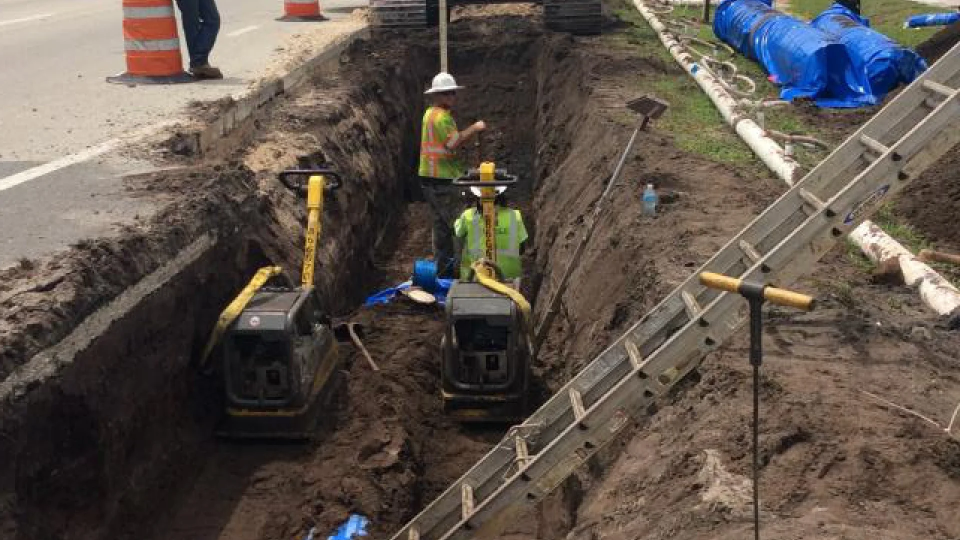 workers excavating land
