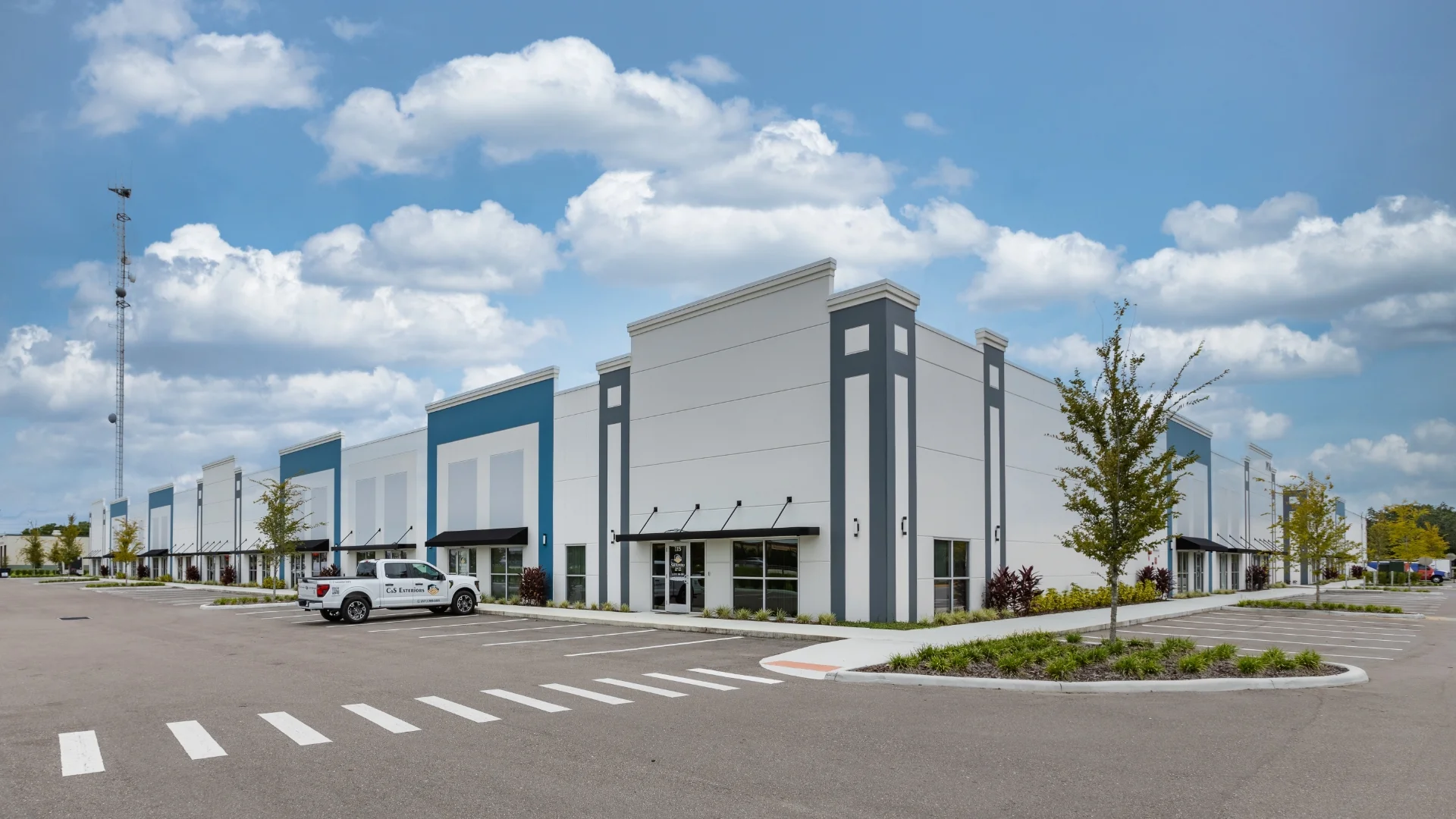 Sandlake Flexspace building front corner exterior and parking lot