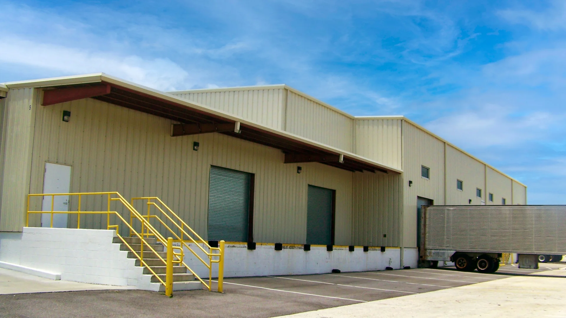 State of Florida Department of Agriculture Distribution Center Upgrades building exterior with ramp
