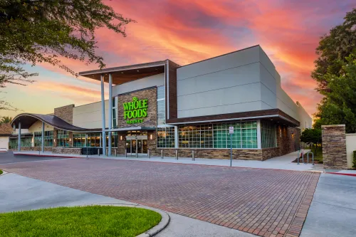 Whole Foods storefront and sunset
