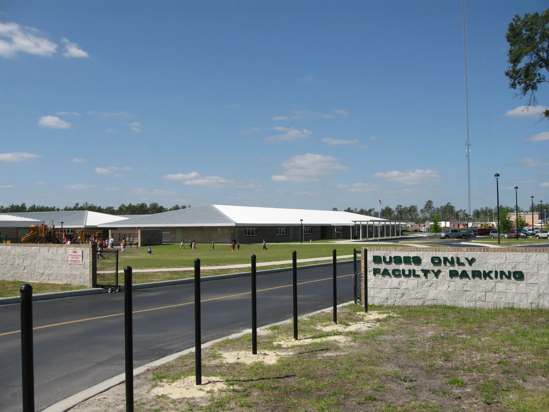 school entrance road and building exteriors with bike racks