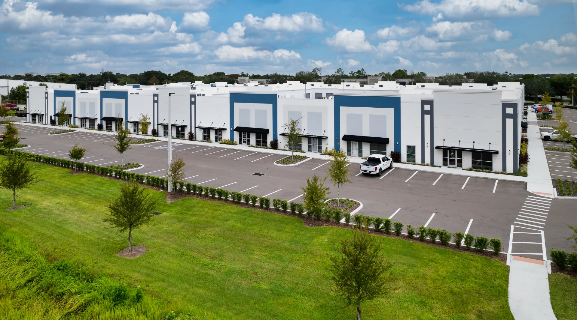 Sandlake Flexspace building exterior and parking lot