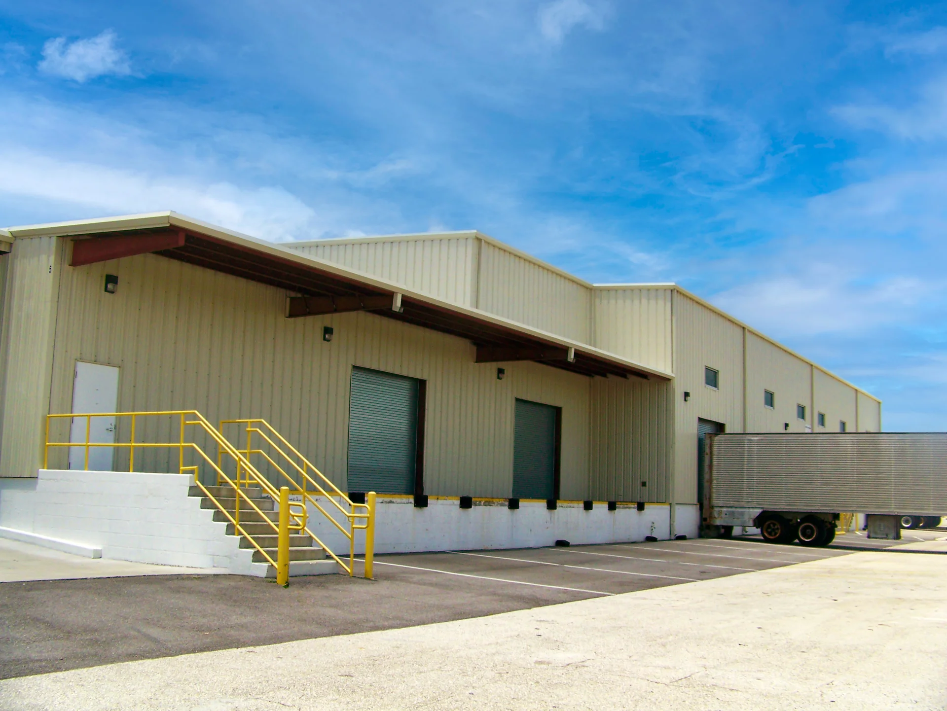 State of Florida Department of Agriculture Distribution Center Upgrades building exterior with ramp
